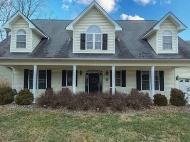 You're invited to experience a home where elegance feels on The Esquire Country Club in West Virginia - for sale on GolfHomes.com, golf home, golf lot