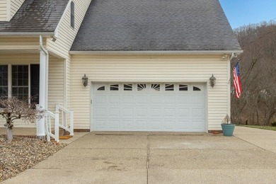 You're invited to experience a home where elegance feels on The Esquire Country Club in West Virginia - for sale on GolfHomes.com, golf home, golf lot