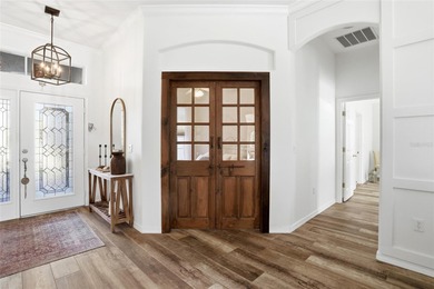 This home is a dream come true! Completely renovated with wood on Glen Abbey Golf Club in Florida - for sale on GolfHomes.com, golf home, golf lot