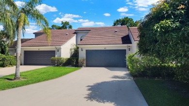 Unlock the potential of this spacious three-bedroom/two and half on PGA National Golf Club in Florida - for sale on GolfHomes.com, golf home, golf lot