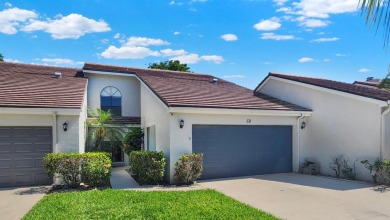 Unlock the potential of this spacious three-bedroom/two and half on PGA National Golf Club in Florida - for sale on GolfHomes.com, golf home, golf lot