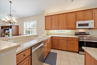 LIVE ON VACATION NOW in this well-maintained 2-bedroom PLUS DEN on The Preserve Golf Club At Tara in Florida - for sale on GolfHomes.com, golf home, golf lot