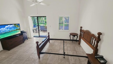 Unlock the potential of this spacious three-bedroom/two and half on PGA National Golf Club in Florida - for sale on GolfHomes.com, golf home, golf lot