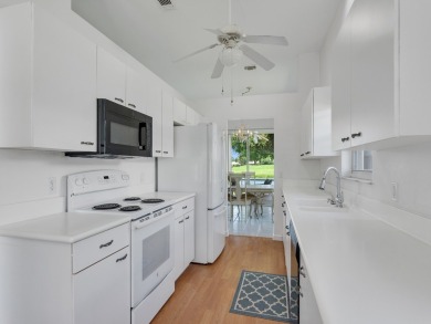 Invest in Location with this Lakefront property overlooking the on Meadowood Golf and Tennis Club in Florida - for sale on GolfHomes.com, golf home, golf lot