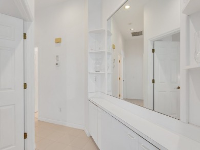 Invest in Location with this Lakefront property overlooking the on Meadowood Golf and Tennis Club in Florida - for sale on GolfHomes.com, golf home, golf lot
