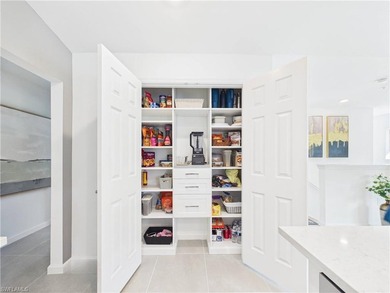 Welcome to elevated, resort-style living at 5683 Mayflower Way on Panther Run Golf Club in Florida - for sale on GolfHomes.com, golf home, golf lot