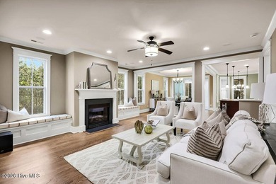 Welcome to this charming home with an inviting, rocking on Cape Fear National At Brunswick Forest in North Carolina - for sale on GolfHomes.com, golf home, golf lot