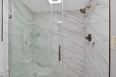 This totally remodeled unit is one to see! It boasts luxury on Kelly Greens Golf and Country Club in Florida - for sale on GolfHomes.com, golf home, golf lot