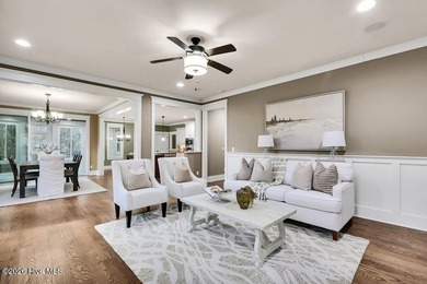 Welcome to this charming home with an inviting, rocking on Cape Fear National At Brunswick Forest in North Carolina - for sale on GolfHomes.com, golf home, golf lot