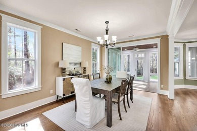 Welcome to this charming home with an inviting, rocking on Cape Fear National At Brunswick Forest in North Carolina - for sale on GolfHomes.com, golf home, golf lot