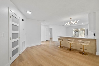 One or more photo(s) has been virtually staged. Stunning on Mangrove Bay Golf Course in Florida - for sale on GolfHomes.com, golf home, golf lot