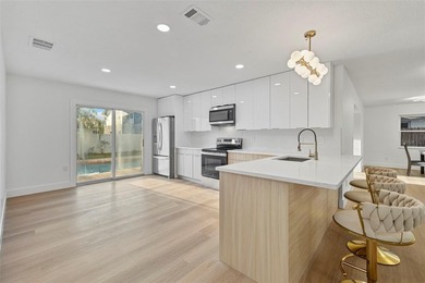 One or more photo(s) has been virtually staged. Stunning on Mangrove Bay Golf Course in Florida - for sale on GolfHomes.com, golf home, golf lot