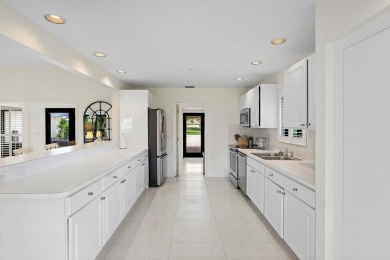 Welcome to this beautifully maintained  villa offering beautiful on Quail Ridge Golf Course and Country Club in Florida - for sale on GolfHomes.com, golf home, golf lot