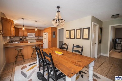 Welcome to your serene sanctuary in East Side Huntington on Hulman Links Golf Course in Indiana - for sale on GolfHomes.com, golf home, golf lot