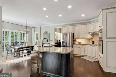 Welcome to this stunning brick entertainer's DREAM HOME in Towne on Towne Lake Hills Golf Club in Georgia - for sale on GolfHomes.com, golf home, golf lot