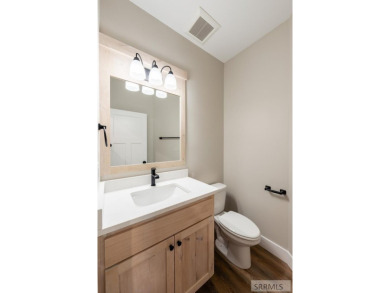 Situated on 0.29 acres, its brand-new faade exudes modern on Sage Lakes Municipal Golf Course in Idaho - for sale on GolfHomes.com, golf home, golf lot