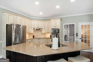 Welcome to this stunning brick entertainer's DREAM HOME in Towne on Towne Lake Hills Golf Club in Georgia - for sale on GolfHomes.com, golf home, golf lot