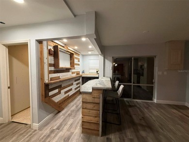 Short Sale. This LARGE 4/2/2 pool home sits on a peaceful on Port Charlotte Golf Club in Florida - for sale on GolfHomes.com, golf home, golf lot