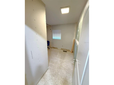 Short Sale. This LARGE 4/2/2 pool home sits on a peaceful on Port Charlotte Golf Club in Florida - for sale on GolfHomes.com, golf home, golf lot