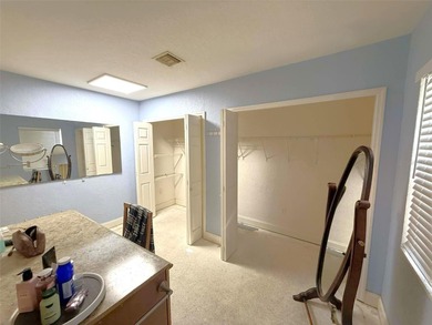 Short Sale. This LARGE 4/2/2 pool home sits on a peaceful on Port Charlotte Golf Club in Florida - for sale on GolfHomes.com, golf home, golf lot