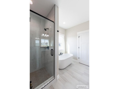Situated on 0.29 acres, its brand-new faade exudes modern on Sage Lakes Municipal Golf Course in Idaho - for sale on GolfHomes.com, golf home, golf lot