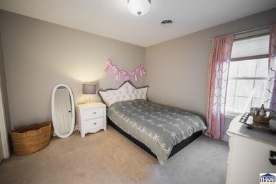 Welcome to your serene sanctuary in East Side Huntington on Hulman Links Golf Course in Indiana - for sale on GolfHomes.com, golf home, golf lot