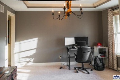 Welcome to your serene sanctuary in East Side Huntington on Hulman Links Golf Course in Indiana - for sale on GolfHomes.com, golf home, golf lot