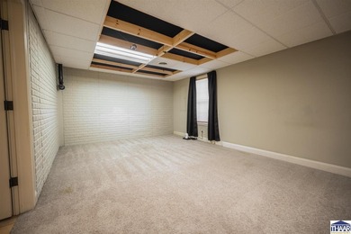 Welcome to your serene sanctuary in East Side Huntington on Hulman Links Golf Course in Indiana - for sale on GolfHomes.com, golf home, golf lot