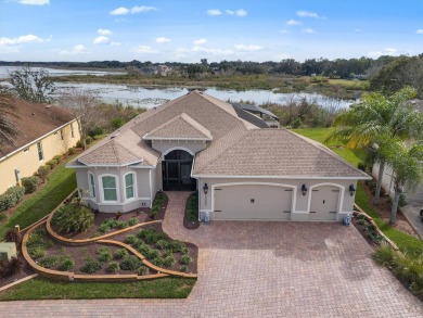 POOL HOME with spectacular WATER VIEW on Lake Miona! Nestled in on Miona Lake Golf Club in Florida - for sale on GolfHomes.com, golf home, golf lot