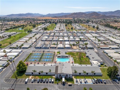 Discover the epitome of relaxed retirement living in this on Colonial Country Club in California - for sale on GolfHomes.com, golf home, golf lot