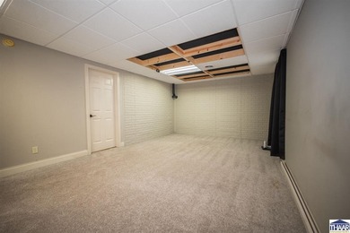 Welcome to your serene sanctuary in East Side Huntington on Hulman Links Golf Course in Indiana - for sale on GolfHomes.com, golf home, golf lot