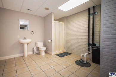 Welcome to your serene sanctuary in East Side Huntington on Hulman Links Golf Course in Indiana - for sale on GolfHomes.com, golf home, golf lot