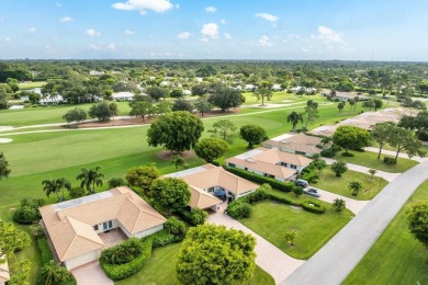 Welcome to this beautifully maintained  villa offering beautiful on Quail Ridge Golf Course and Country Club in Florida - for sale on GolfHomes.com, golf home, golf lot