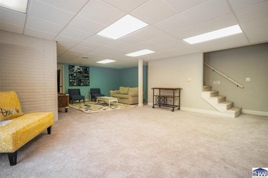 Welcome to your serene sanctuary in East Side Huntington on Hulman Links Golf Course in Indiana - for sale on GolfHomes.com, golf home, golf lot