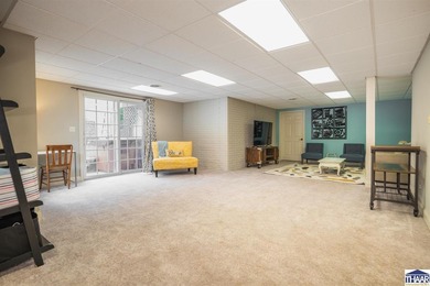 Welcome to your serene sanctuary in East Side Huntington on Hulman Links Golf Course in Indiana - for sale on GolfHomes.com, golf home, golf lot