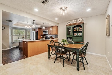CLEAN AND BEAUTIFUL 2 BEDROOMS, 2 BATHROOMS, PLUS BONUS ROOM ON on Seven Springs Golf and Country Club in Florida - for sale on GolfHomes.com, golf home, golf lot