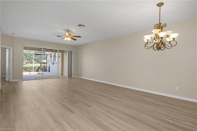 Welcome home to this spaciously designed end unit Villa flooded on Arrowhead Golf Club At Heritage Greens in Florida - for sale on GolfHomes.com, golf home, golf lot