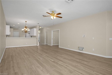 Welcome home to this spaciously designed end unit Villa flooded on Arrowhead Golf Club At Heritage Greens in Florida - for sale on GolfHomes.com, golf home, golf lot