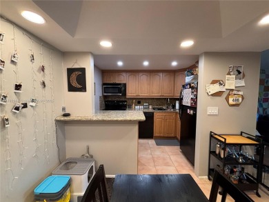 UPDATED 3rd Floor 1 bedroom/1.5 bath condo in International on Inverrary Country Club in Florida - for sale on GolfHomes.com, golf home, golf lot