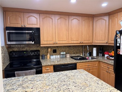 UPDATED 3rd Floor 1 bedroom/1.5 bath condo in International on Inverrary Country Club in Florida - for sale on GolfHomes.com, golf home, golf lot