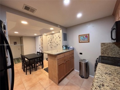 UPDATED 3rd Floor 1 bedroom/1.5 bath condo in International on Inverrary Country Club in Florida - for sale on GolfHomes.com, golf home, golf lot