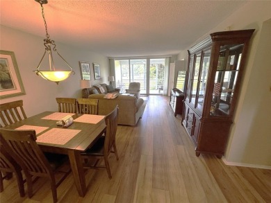 Beautifully updated 2BR/2BA condo in lush Palm Aire with on Palm-Aire Country Club and Resort - The Oaks in Florida - for sale on GolfHomes.com, golf home, golf lot
