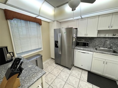 Beautifully updated 2BR/2BA condo in lush Palm Aire with on Palm-Aire Country Club and Resort - The Oaks in Florida - for sale on GolfHomes.com, golf home, golf lot