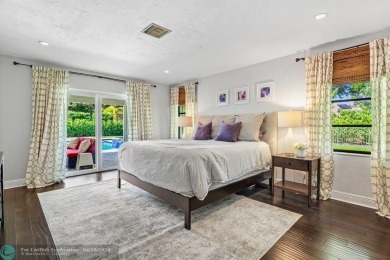 Welcome to 10871 Gleneagles Road, an inviting 4-bedroom on Pine Tree Golf Club in Florida - for sale on GolfHomes.com, golf home, golf lot