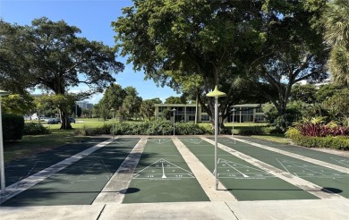 Beautifully updated 2BR/2BA condo in lush Palm Aire with on Palm-Aire Country Club and Resort - The Oaks in Florida - for sale on GolfHomes.com, golf home, golf lot