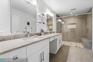 Welcome to 10871 Gleneagles Road, an inviting 4-bedroom on Pine Tree Golf Club in Florida - for sale on GolfHomes.com, golf home, golf lot