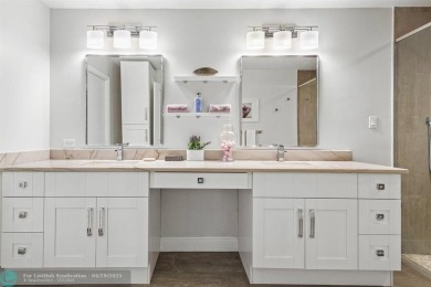Welcome to 10871 Gleneagles Road, an inviting 4-bedroom on Pine Tree Golf Club in Florida - for sale on GolfHomes.com, golf home, golf lot