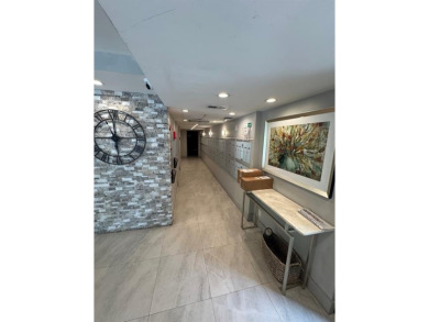 Beautifully updated 2BR/2BA condo in lush Palm Aire with on Palm-Aire Country Club and Resort - The Oaks in Florida - for sale on GolfHomes.com, golf home, golf lot