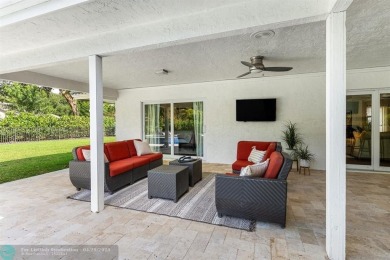 Welcome to 10871 Gleneagles Road, an inviting 4-bedroom on Pine Tree Golf Club in Florida - for sale on GolfHomes.com, golf home, golf lot