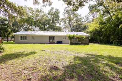 Welcome, golf enthusiasts! Step into this charming four-bedroom on Chiefland Golf and Country Club in Florida - for sale on GolfHomes.com, golf home, golf lot